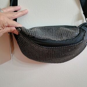 Sleek Black and Silver Satchel with Modern Design